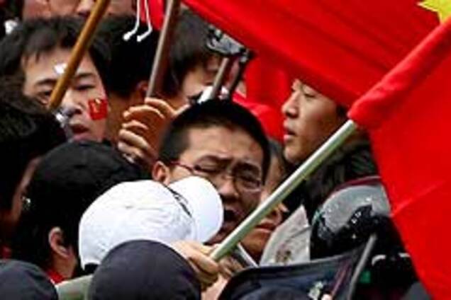 Олимпийская эстафета закончилась попыткой самосожжения