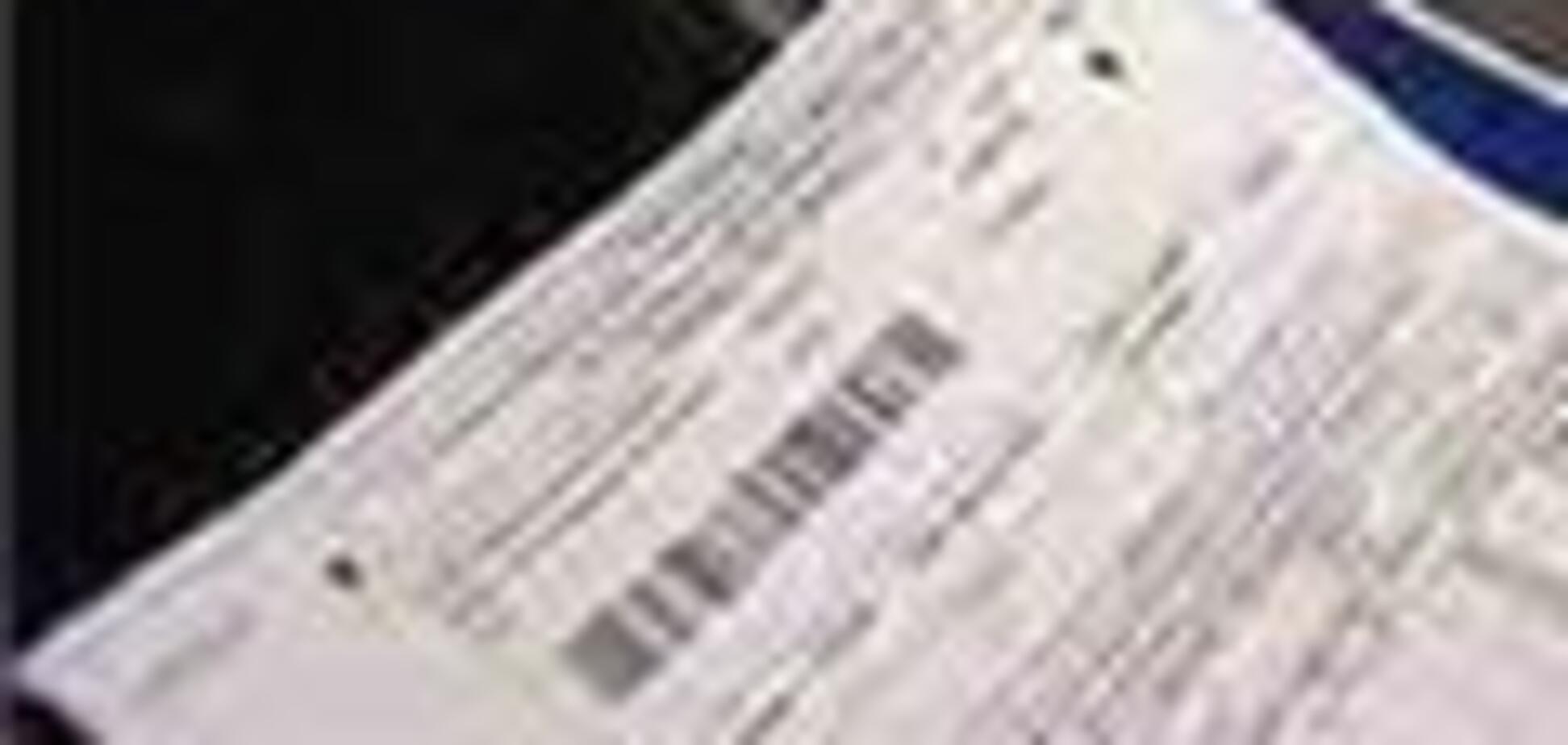 Имена коммунальных должников 'украсят' рекламные экраны