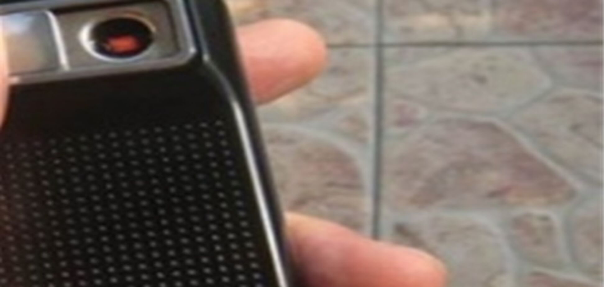 Китайцы разработали телефон с прикуривателем