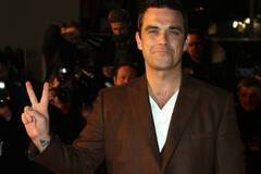 Робби Уильямс женился и бросил курить