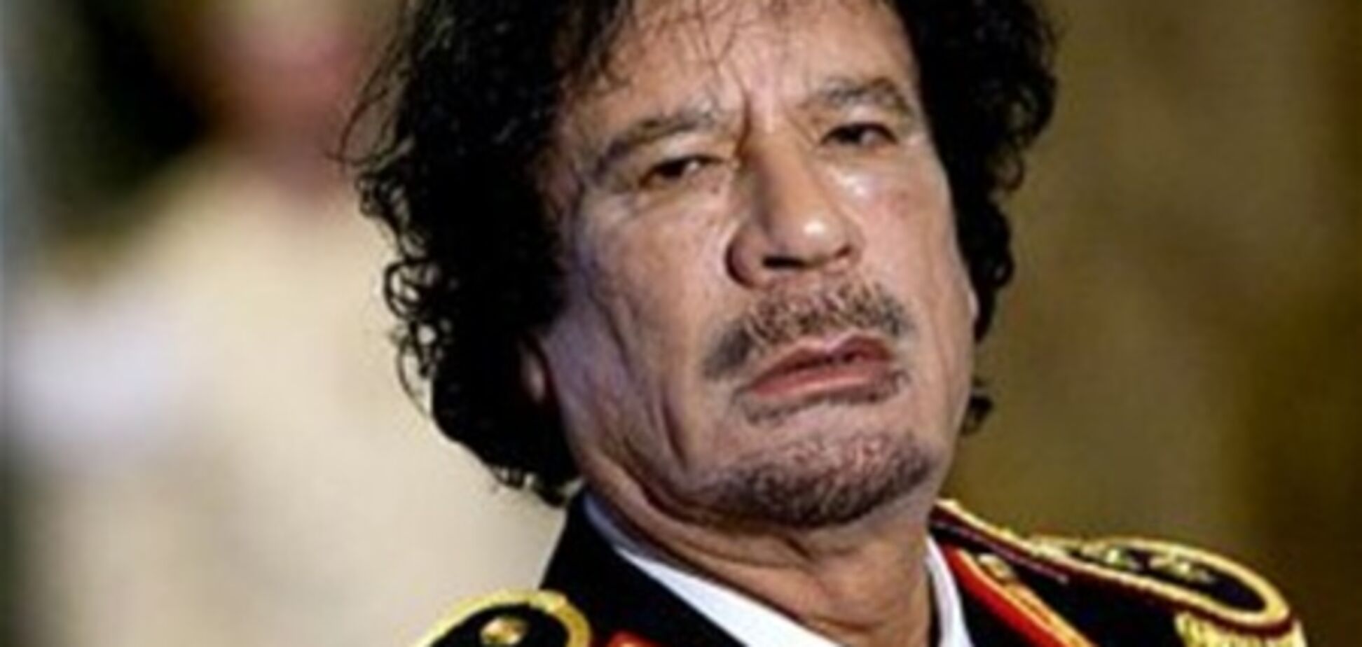 Кадаффи угрожает объявлением 'священной войны'