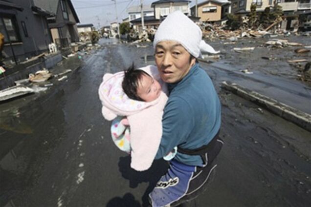 4-месячная японка чудом выжила, проведя под завалами три дня. Фото