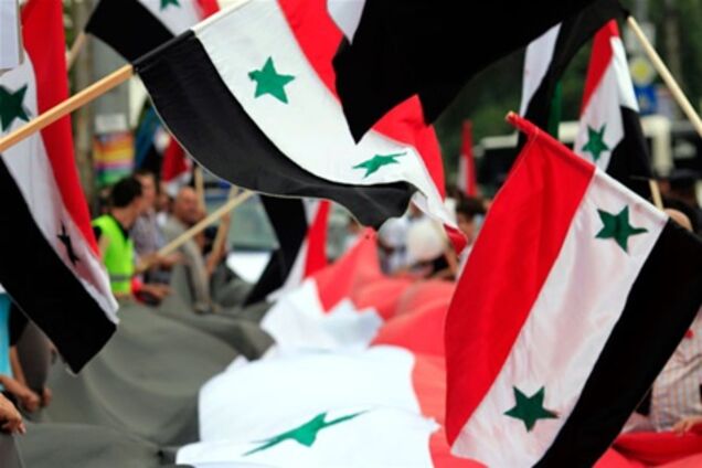 Оппозиция Сирии в День гнева сожгла российский флаг