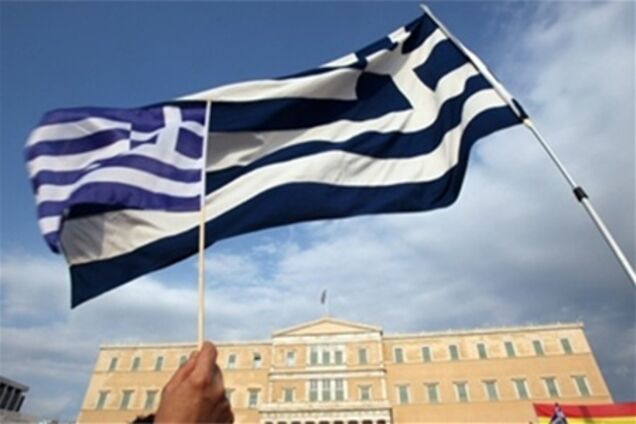 Дефолт Греции неизбежен - Fitch