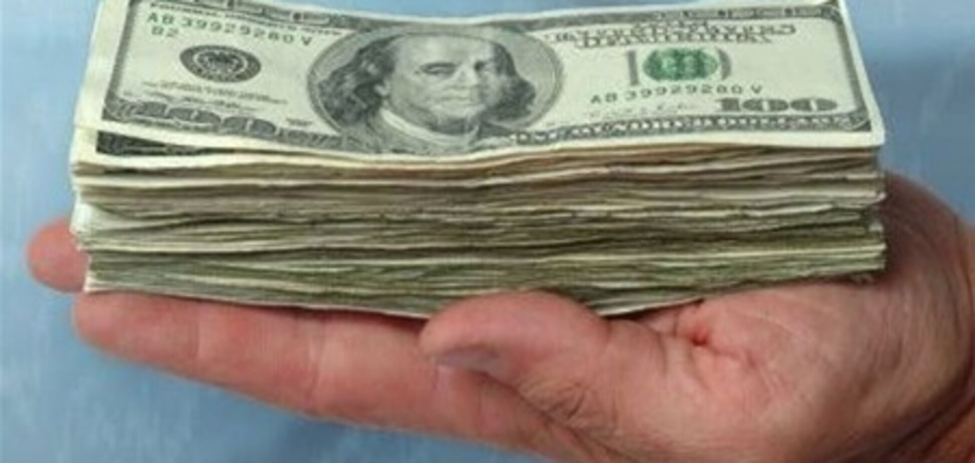 Эксперты: в 2012 золото подорожает до 2000 долларов за унцию