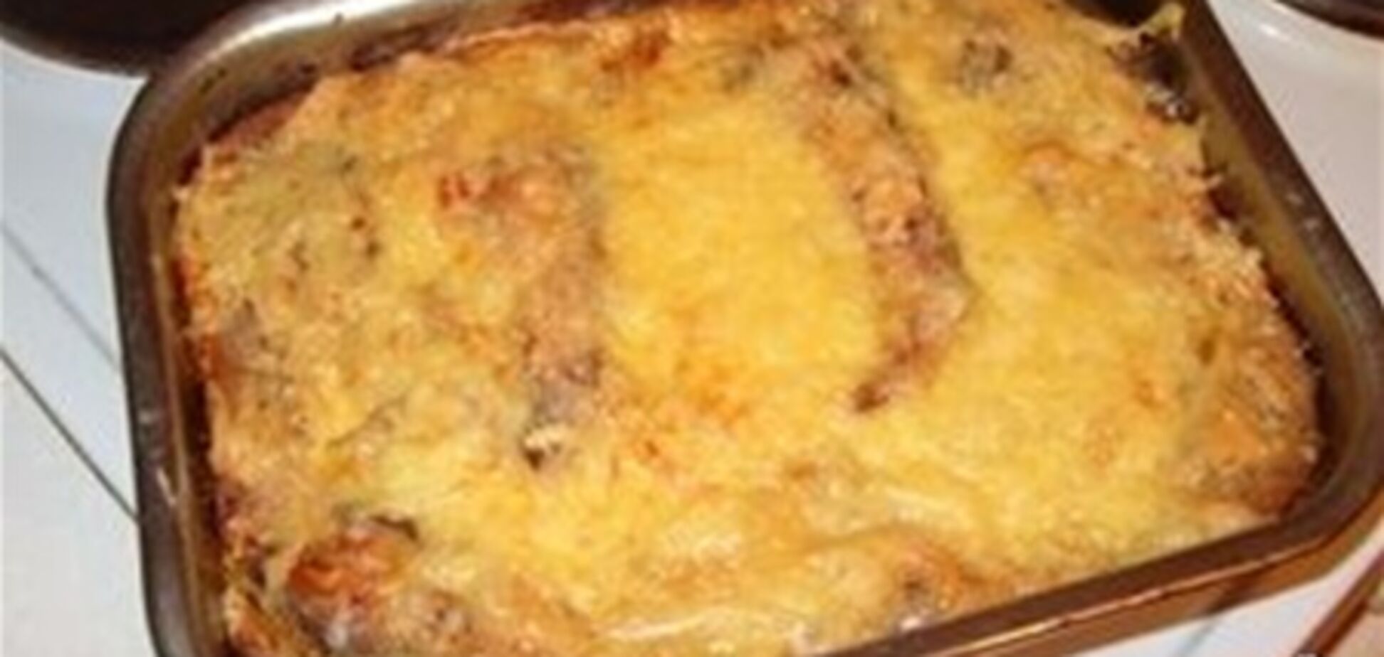 Карп запеченный под сыром