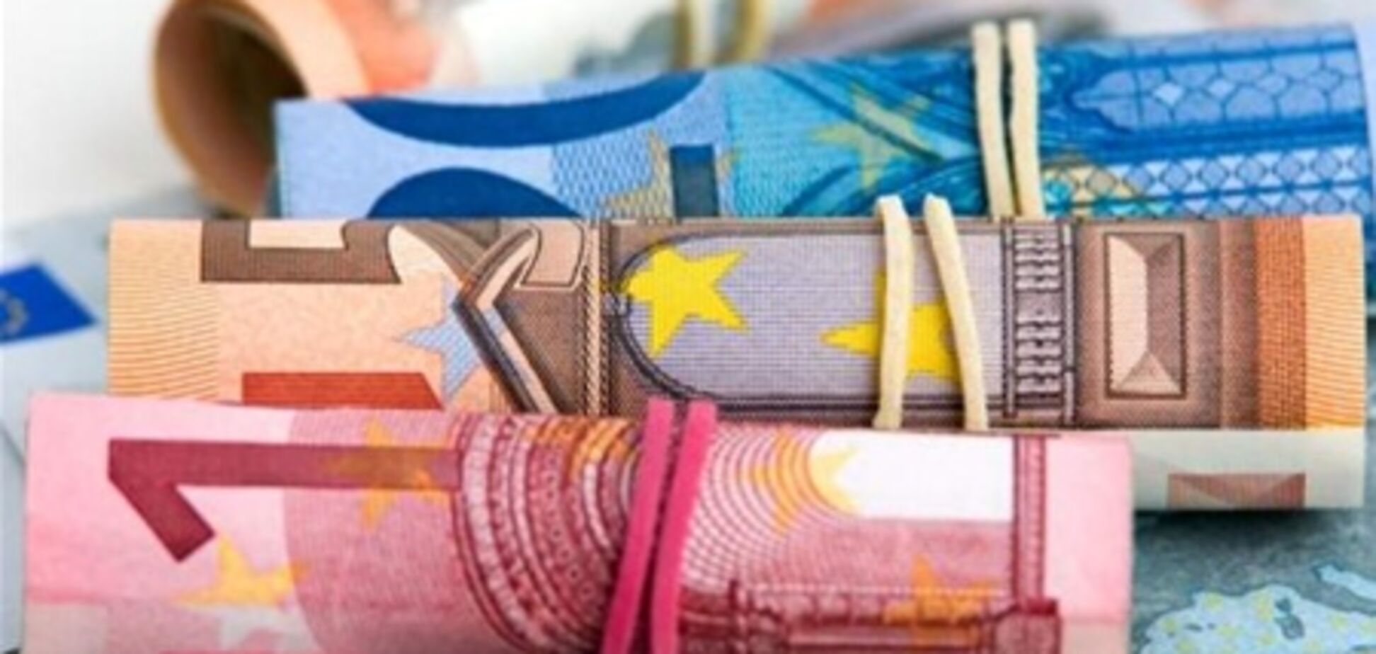 Евро дорожает по отношению к доллару , 13 марта 2012