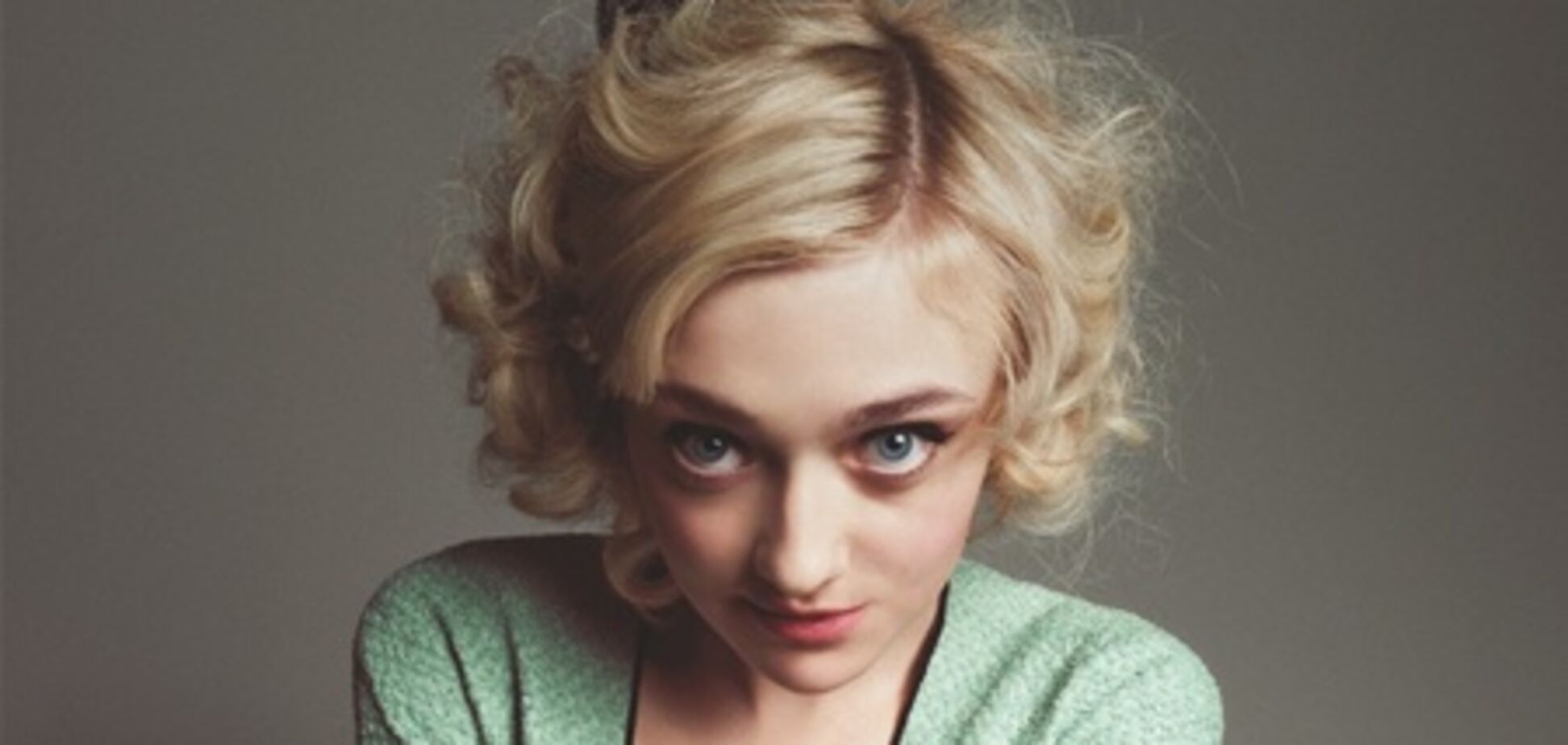 Фаннинг сказочно мила для Wonderland. Фото