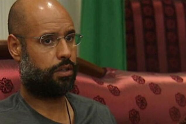 Сына Каддафи передадут официальным властям Ливии 