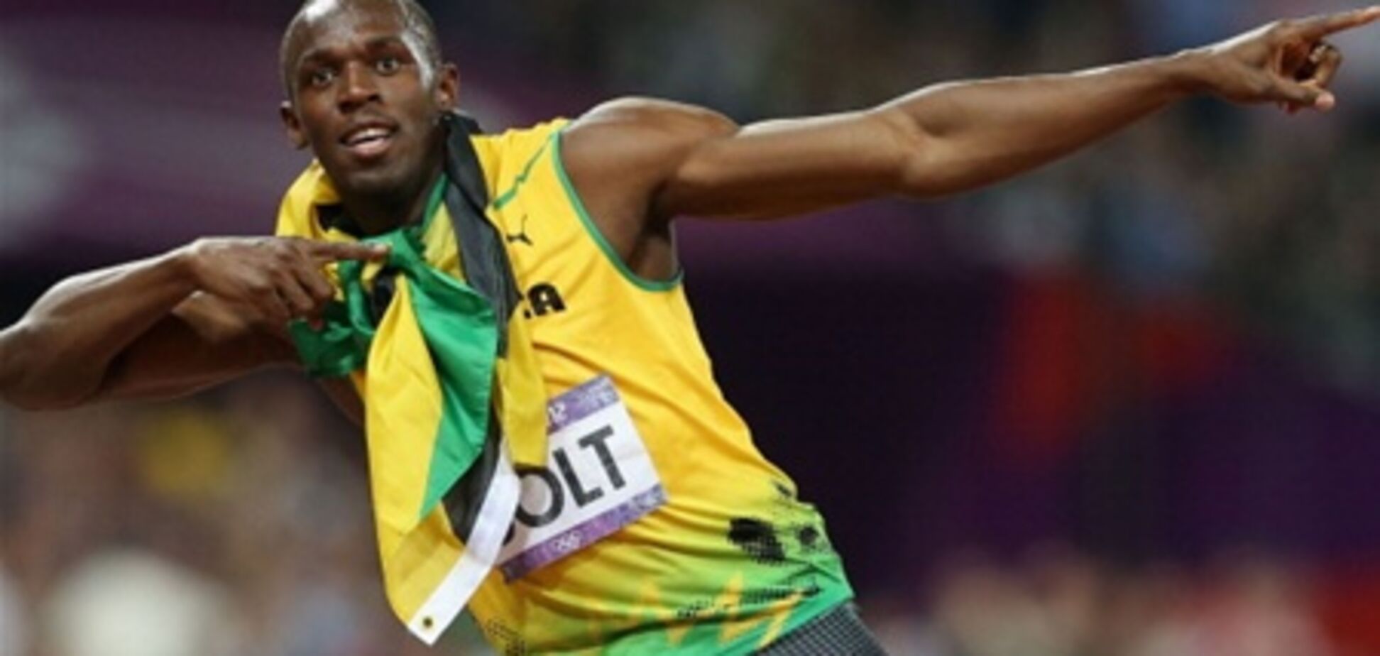 Знаменитый Болт - чемпион Олимпиады в беге на 200 метров