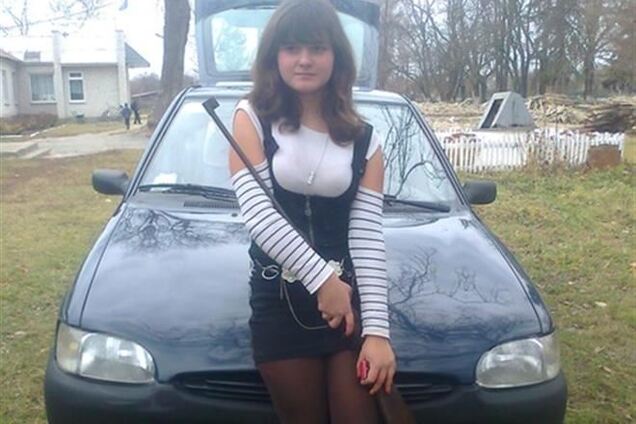 Сестра коммуниста Присяжнюка публично матерится и носит оружие