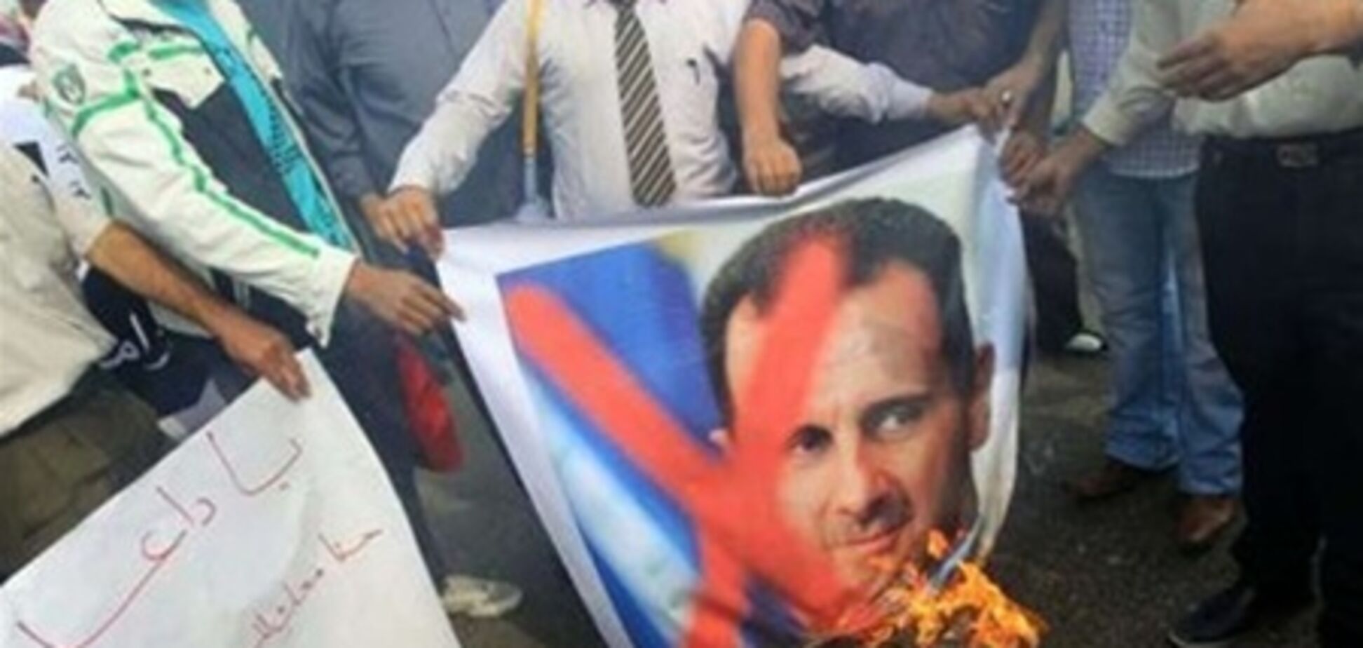 Асад осудил расширение США помощи повстанцам