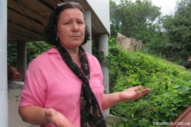 Дом киевской учительницы атаковали, пока она была на суде