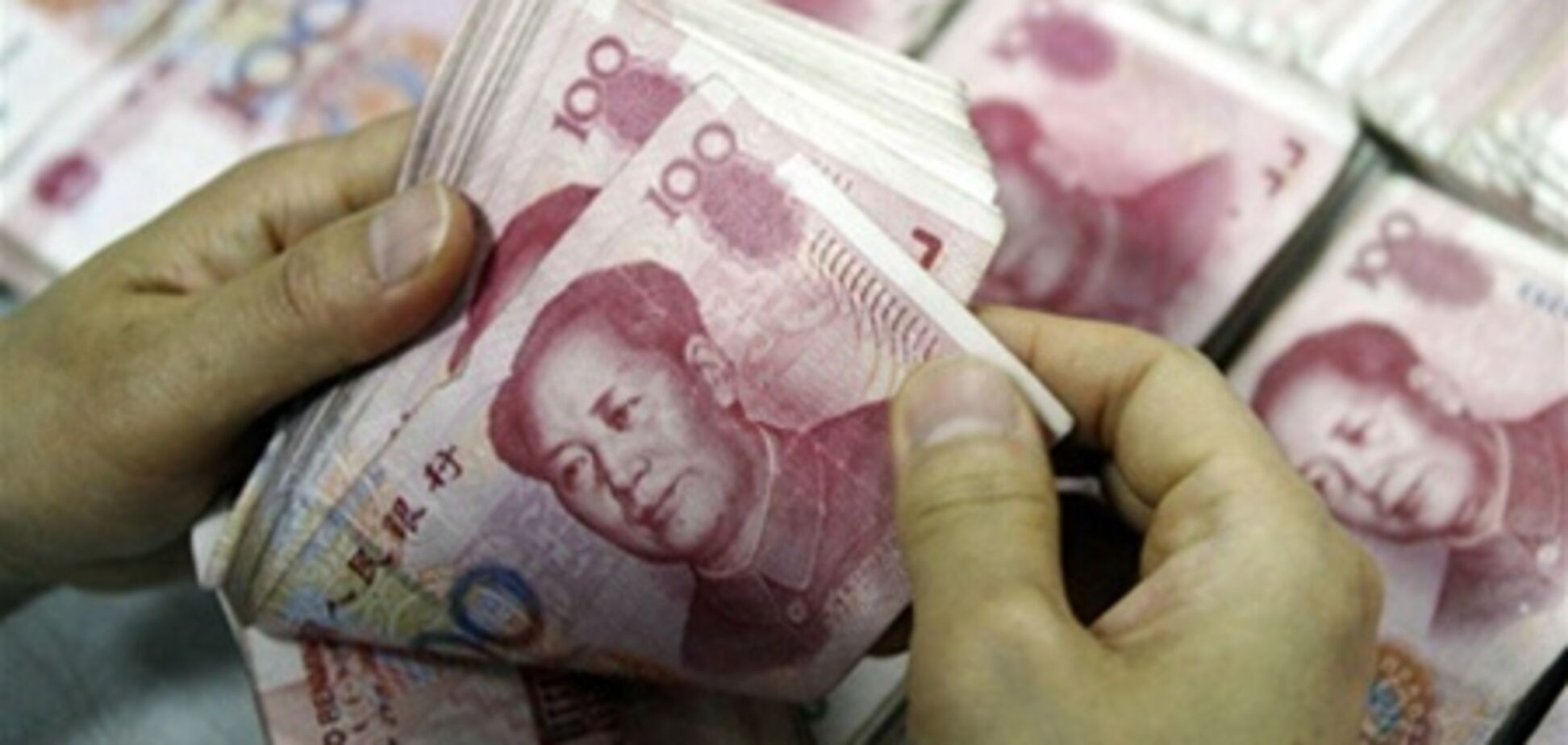 Fitch: теневая банковская система угрожает экономике Китая 
