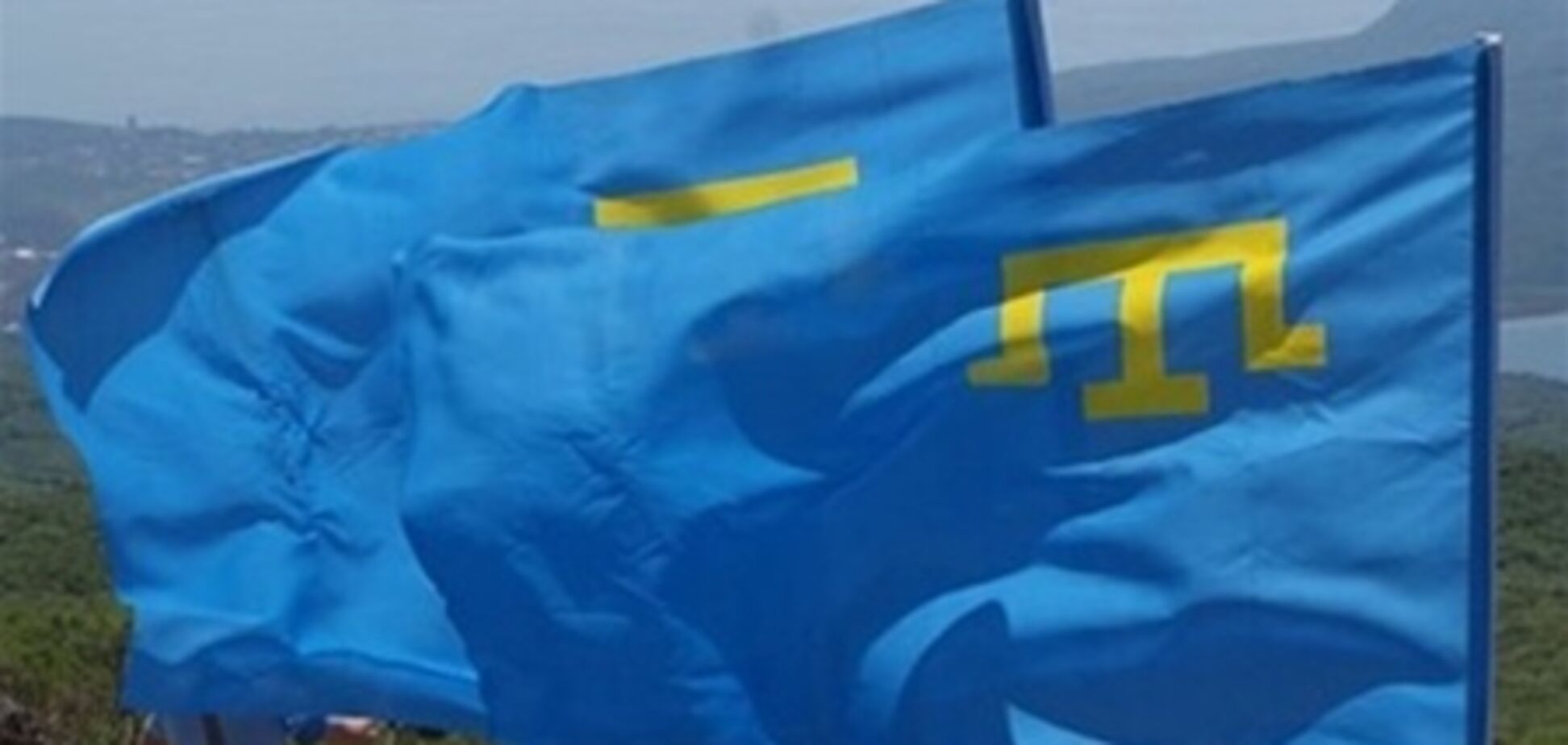 Секретаря Меджлісу викликали в СБУ за любов до кримськотатарського прапору