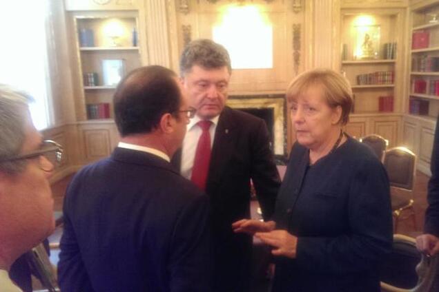 Путін залишив нараду, Порошенко залишився з Меркель і Олландом: опубліковано фото