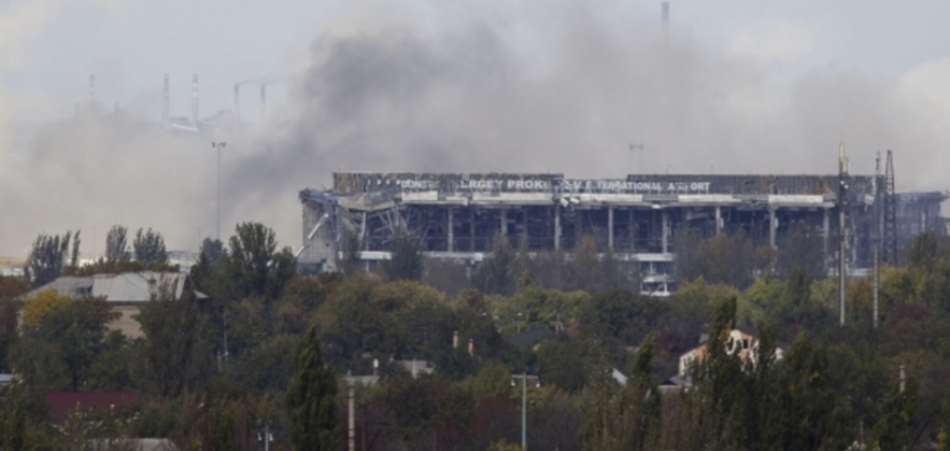 Украина должна покинуть донецкий аэропорт: 'У ополченцев там семьи проживают' - Путин