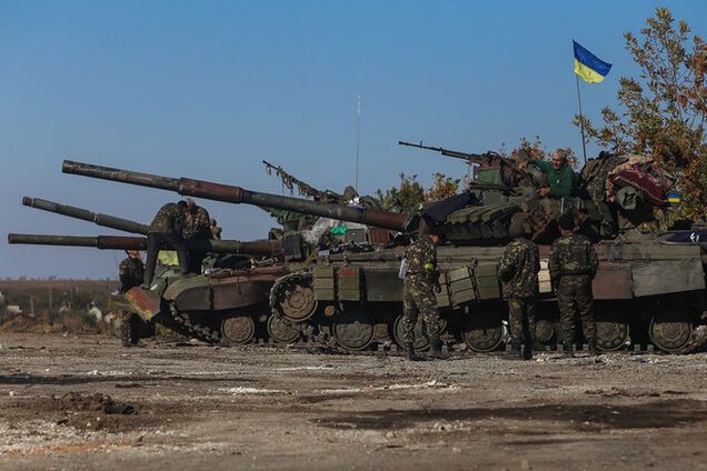 Военные РФ отходят с территории 'ДНР', остаются бандиты