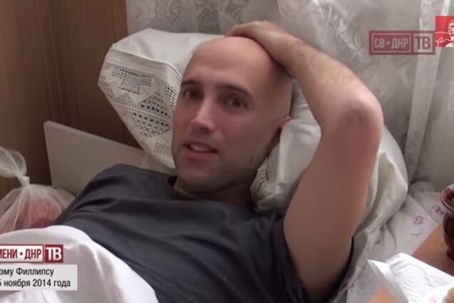 Скандальний журналіст RT розповів про поранення, лежачи на лікарняному ліжку: опубліковано відео