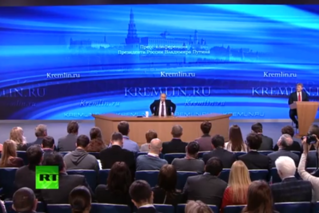 Путин на фоне доллара: выступление во время войны