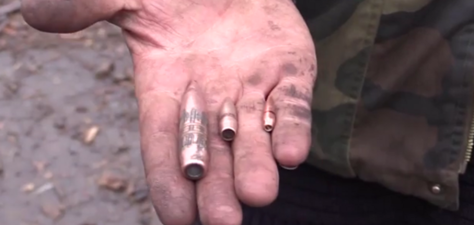 Украинские бойцы показали, какими пулями и снарядами лупят по ним боевики 'ДНР': видеофакт