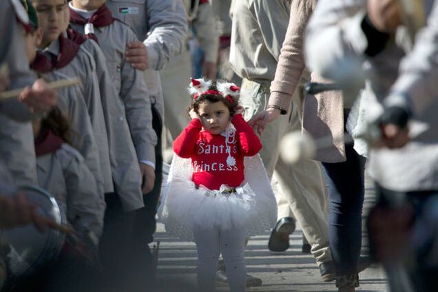 Мир отмечает католическое Рождество: фотографии из 20 стран