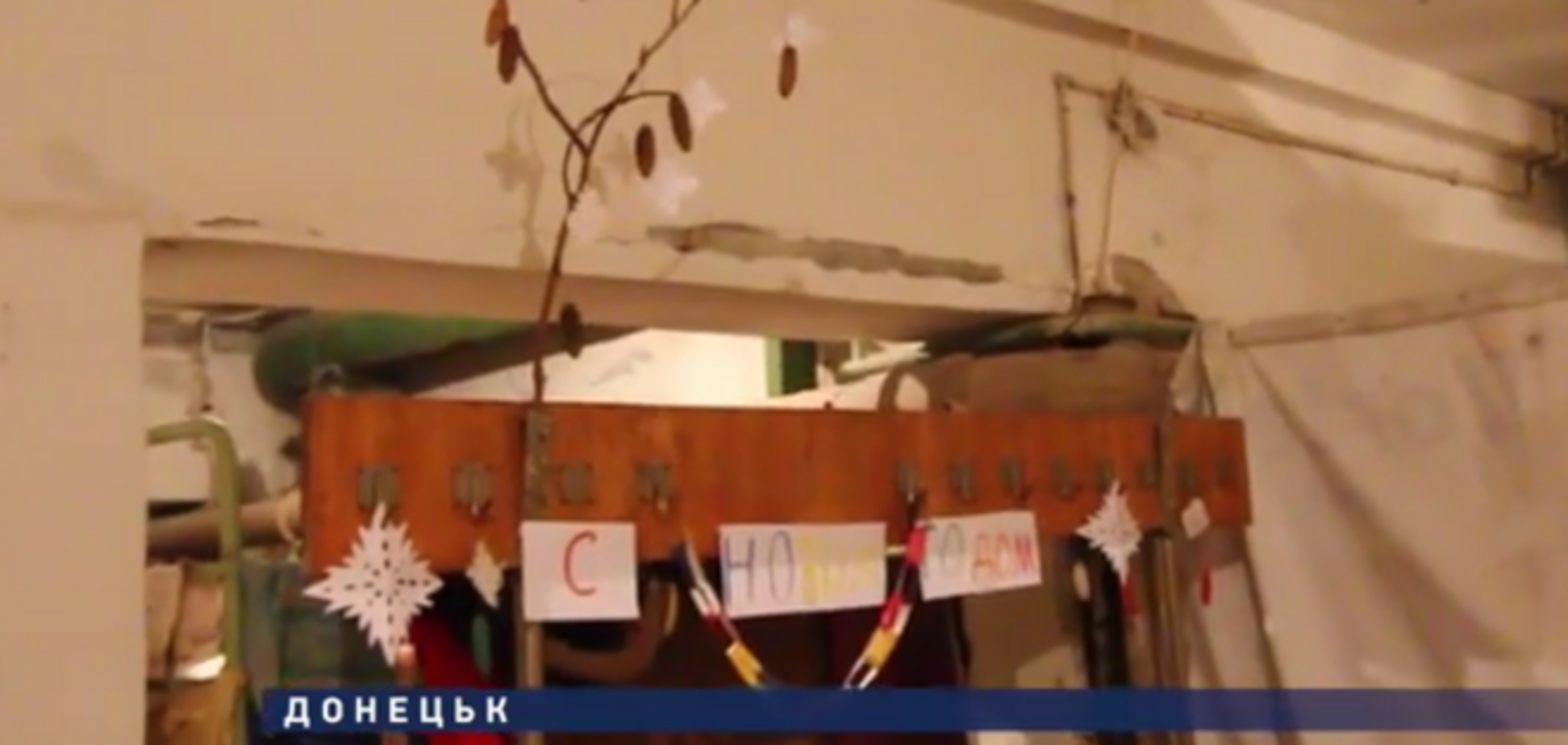 Маленькие дети Донецка готовятся праздновать Новый год в бункере: видеофакт