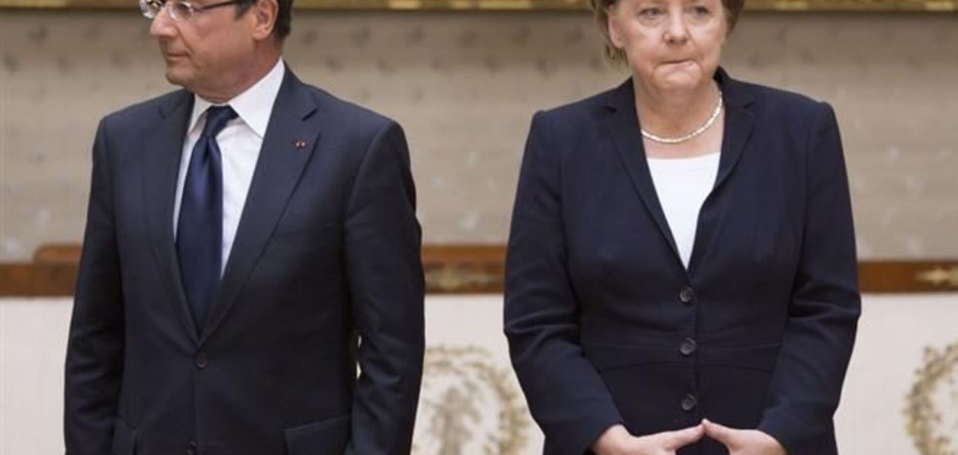 Олланд и Меркель осудили 'отвратительные' акты насилия в Украине