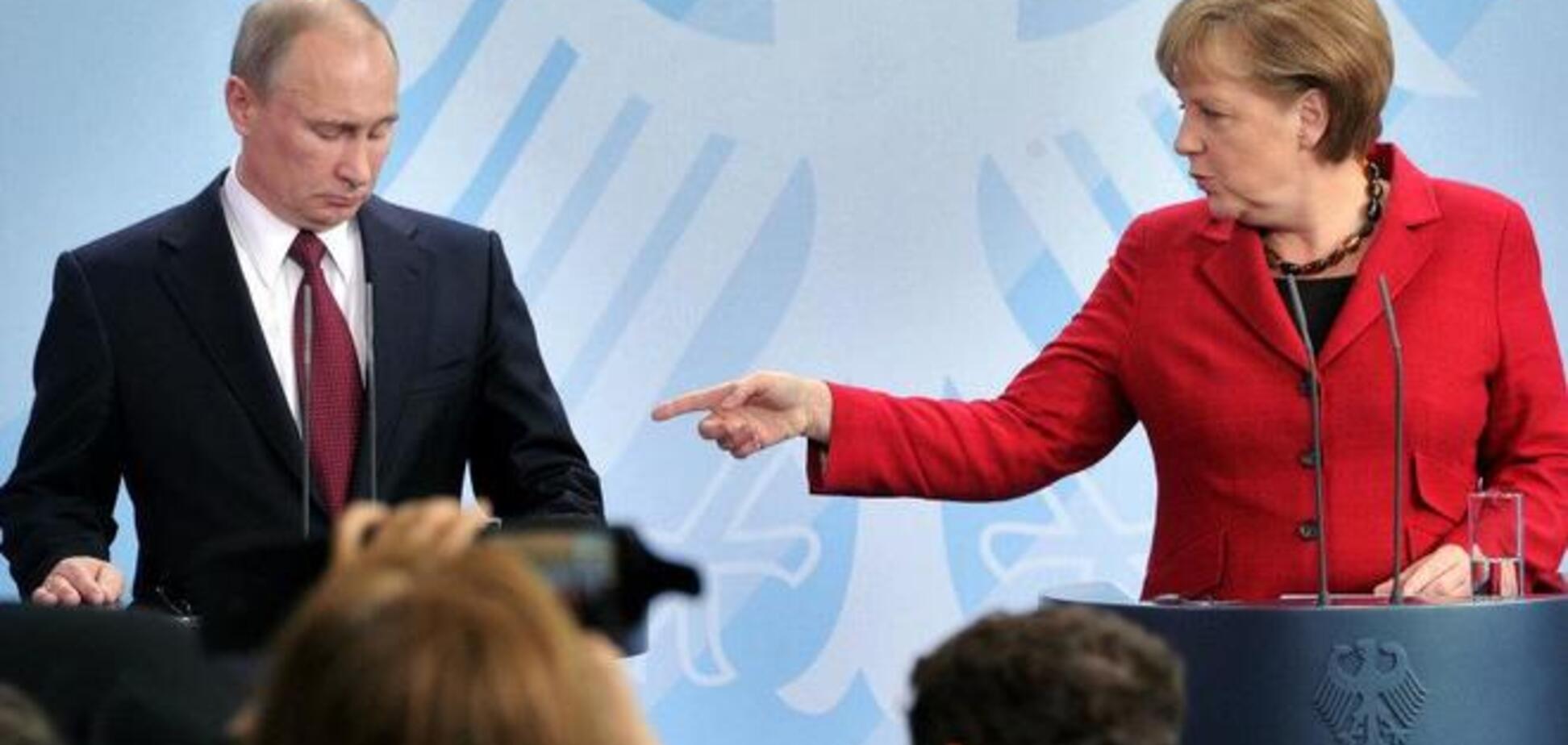 Меркель призвала Путина способствовать выборам в Украине