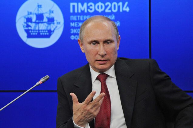 Путин пообещал французским СМИ работать с Порошенко