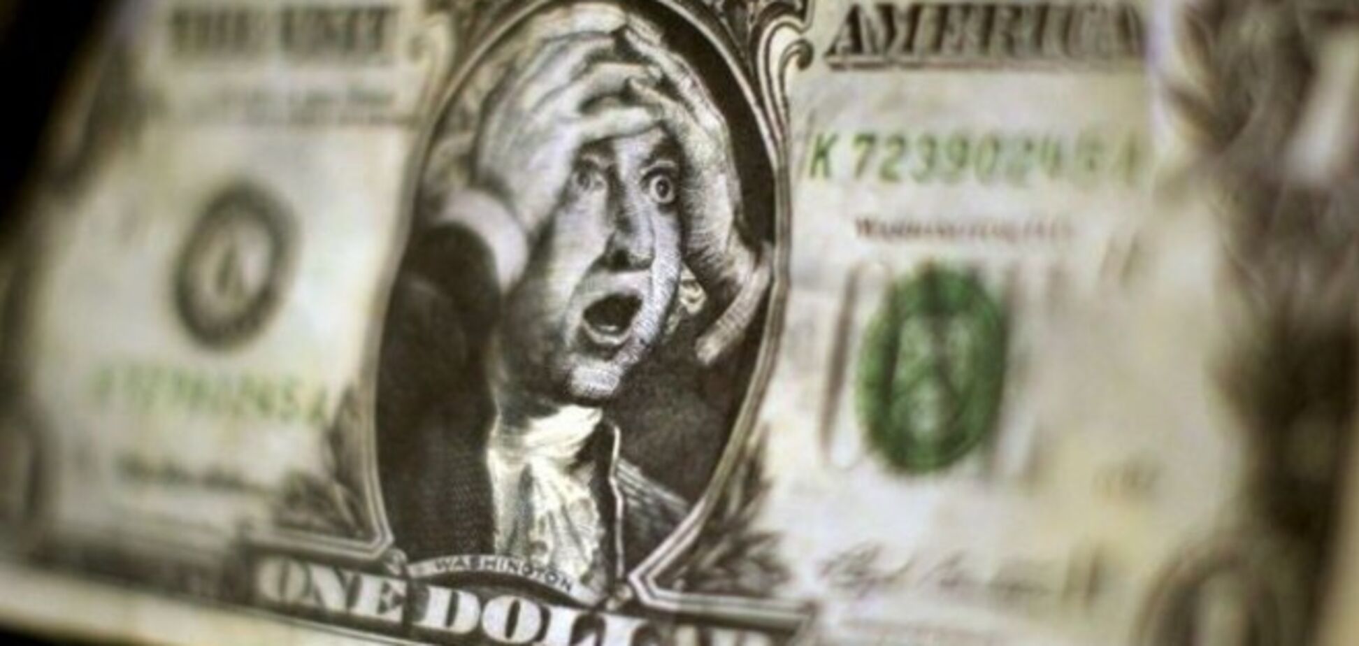 НБУ повысил курс доллара до 12 грн
