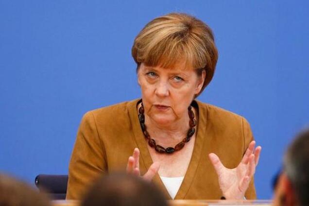 Меркель, несмотря на санкции, готова и дальше сотрудничать с Путиным