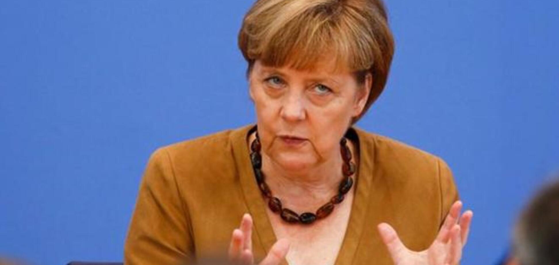 Меркель, несмотря на санкции, готова и дальше сотрудничать с Путиным