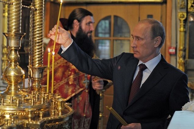Путин поставил в храме свечку 'за защитников Новороссии'
