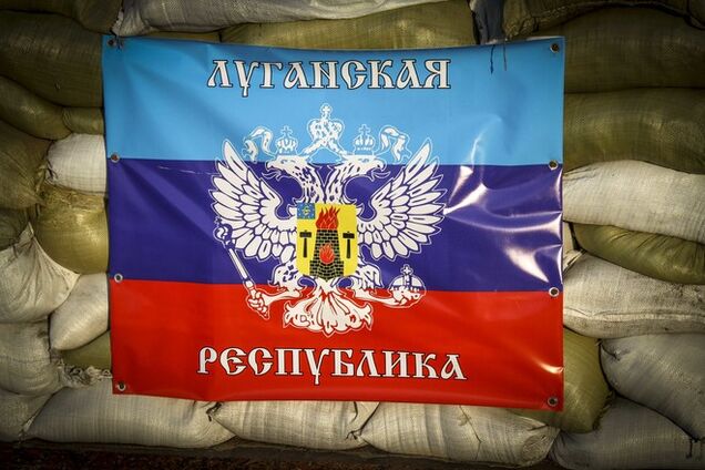 Террористы в Луганске уже пометили элитное жилье надписями 'собственность ЛНР'