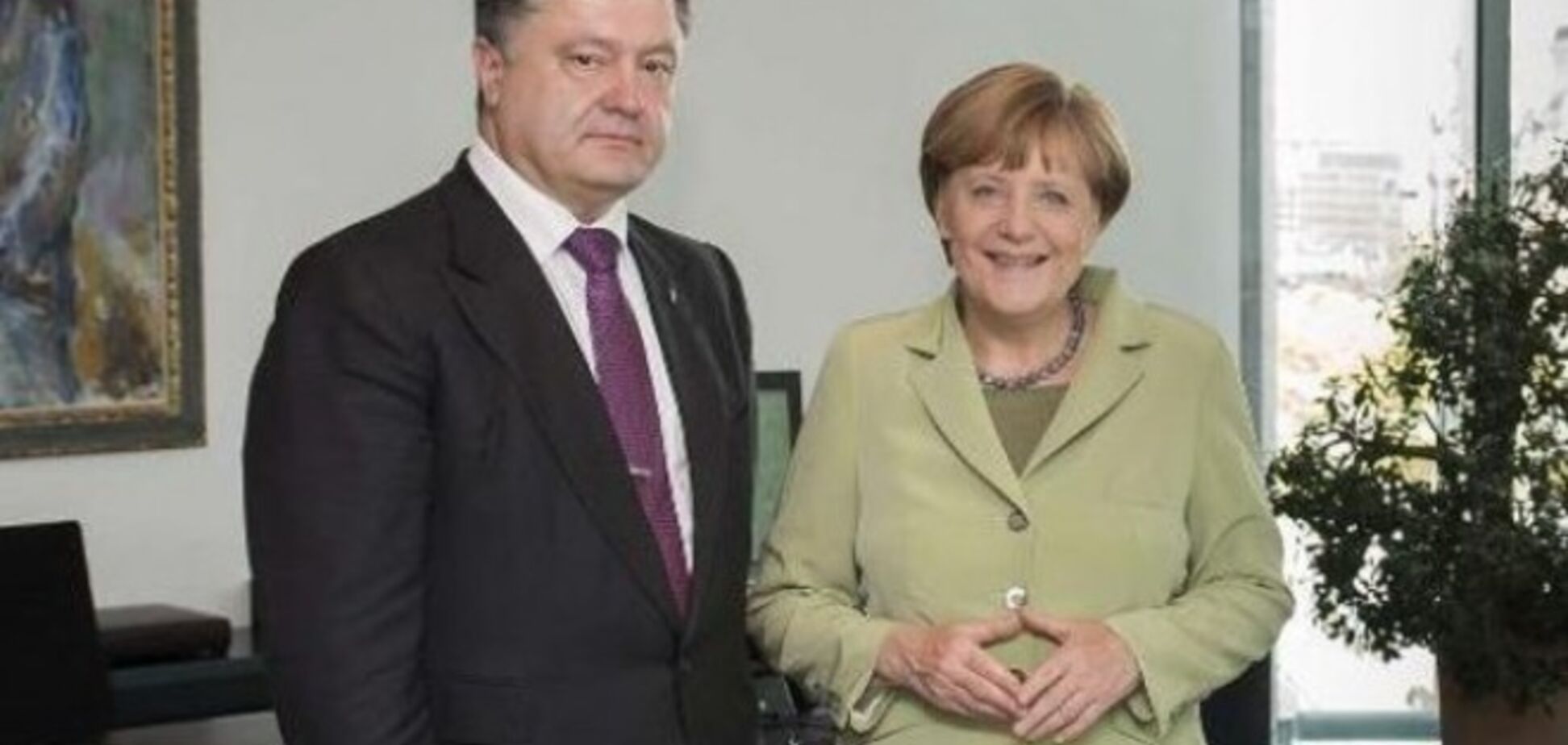Порошенко рассказал Меркель о прогрессе в прекращении огня