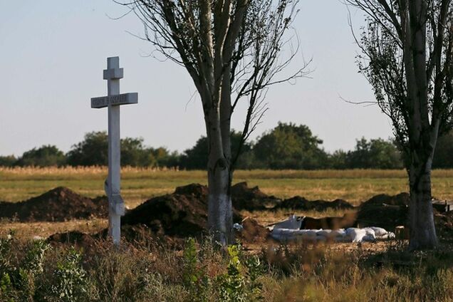 Могилы погибших в зоне АТО разроют после войны