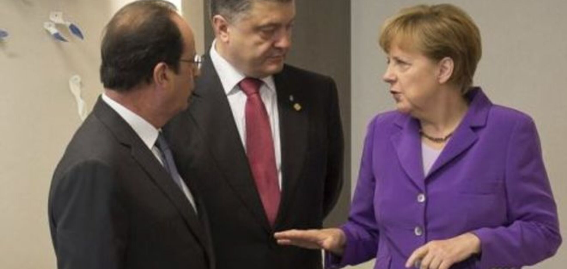 Порошенко, Олланд и Меркель поговорили перед Маршем о Донбассе