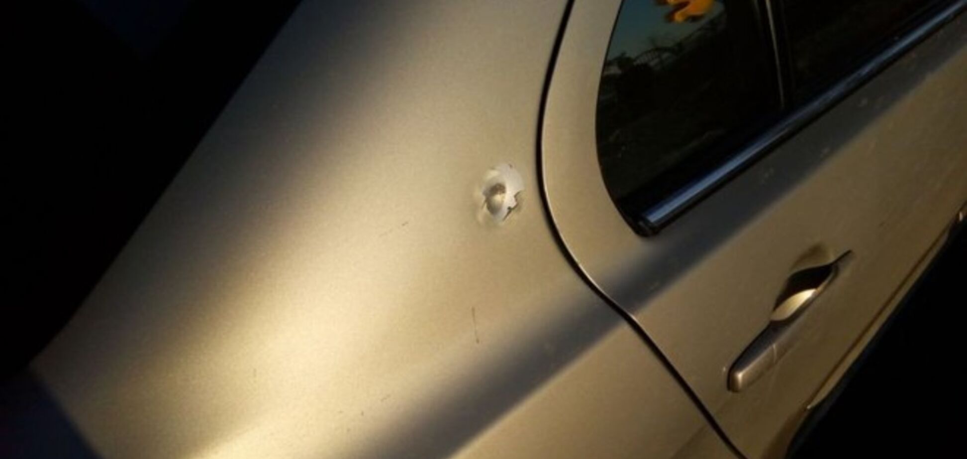 В Днепропетровске таксист на улице застрелил человека