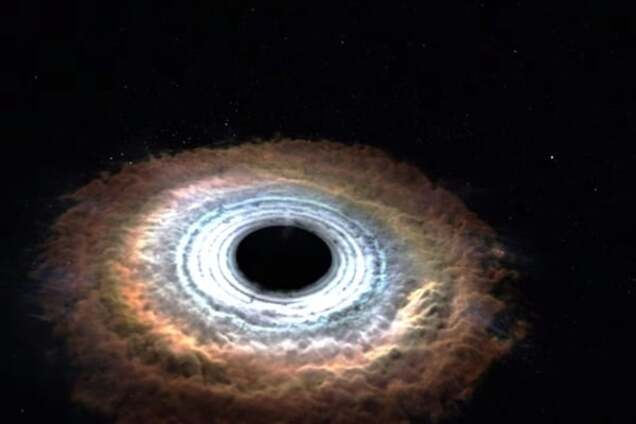 В NASA показали, как черная дыра разрывает звезду: видеофакт