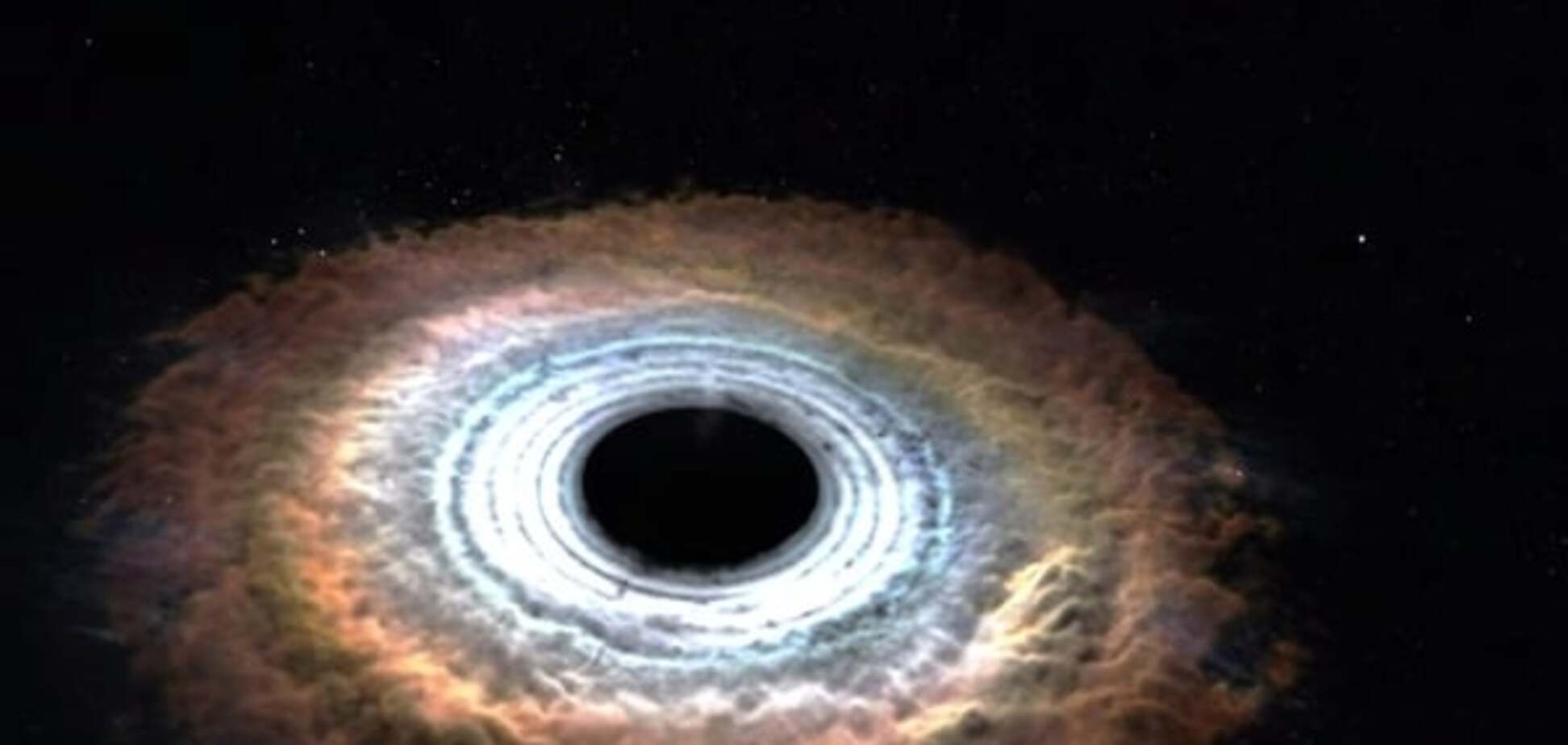 В NASA показали, как черная дыра разрывает звезду: видеофакт