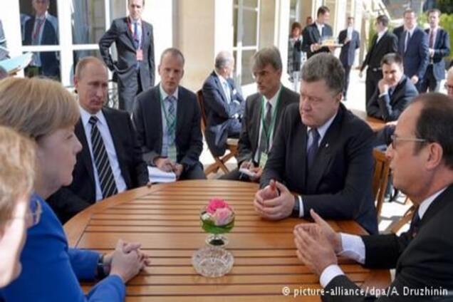 Комментарий: На 'нормандском' саммите Путин выиграл по очкам