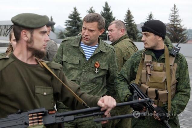 На Донбассе террористы и военные России силой делят награбленное