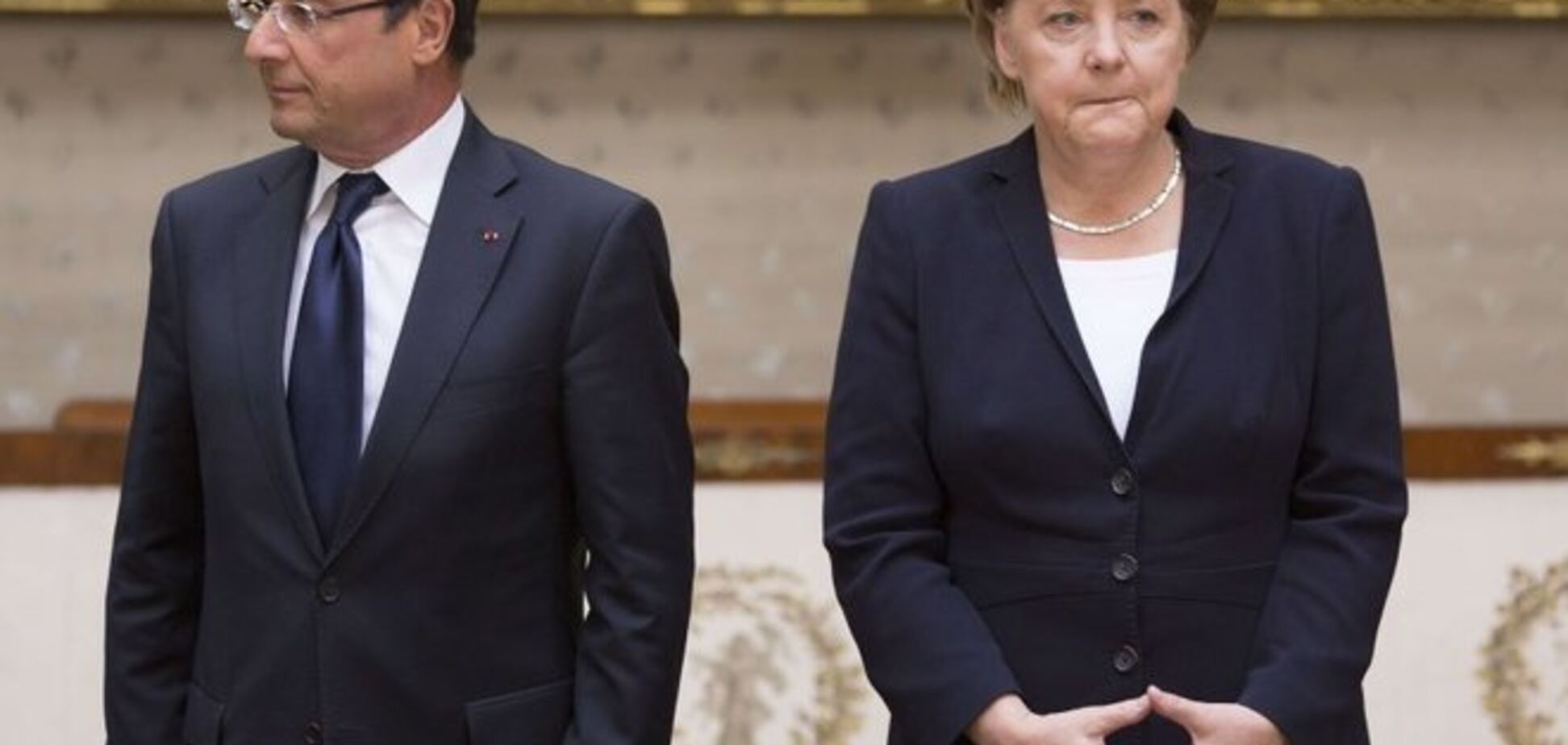 Олланд и Меркель пригрозили новыми санкциями за нарушение минских договоренностей 