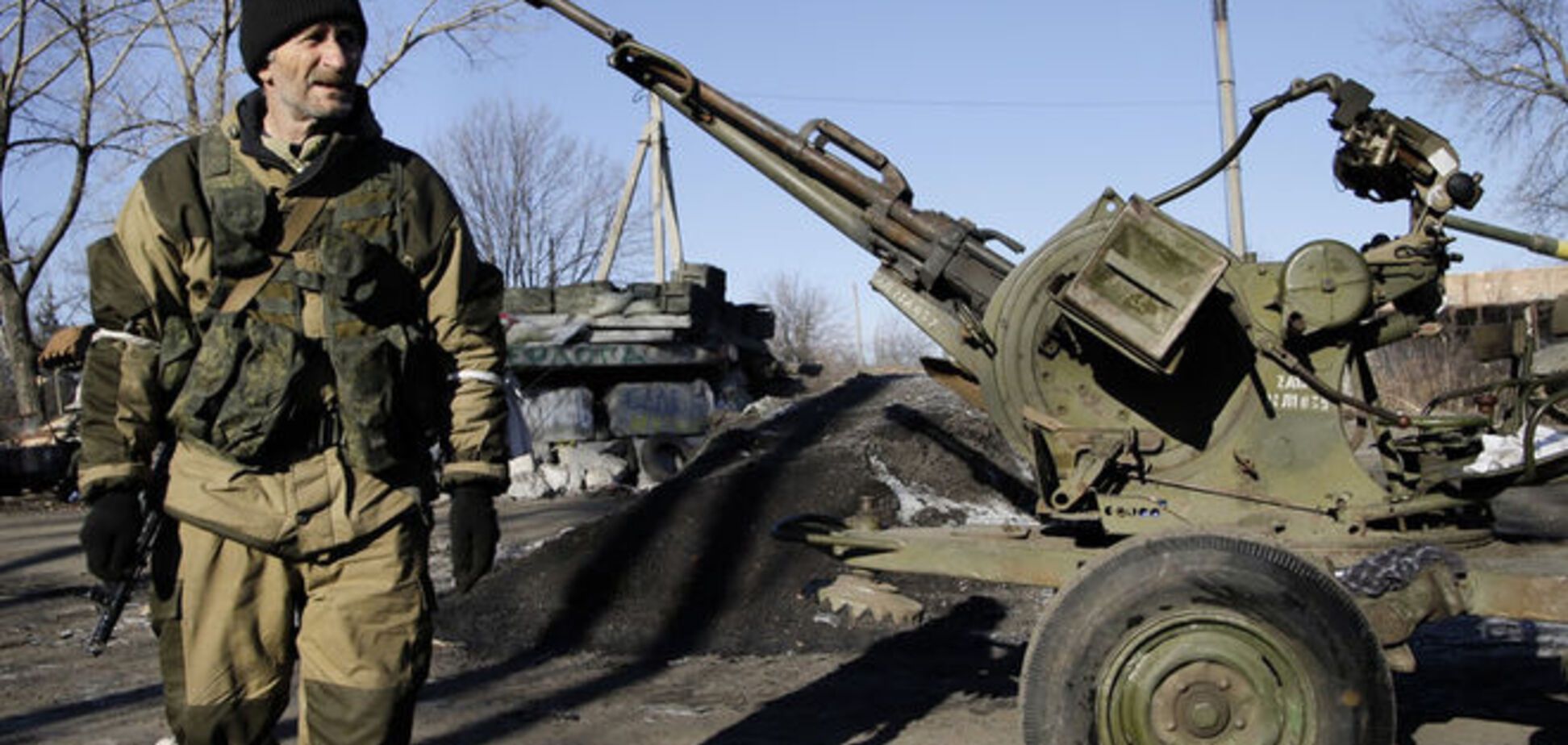 У Путіна розповіли, що заважає терористам відвести важке озброєння на Донбасі