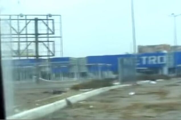 Экскурсия по местам 'подвигов' боевиков в Донецке: разграбленный 'Метро', взорванный Путиловский мост