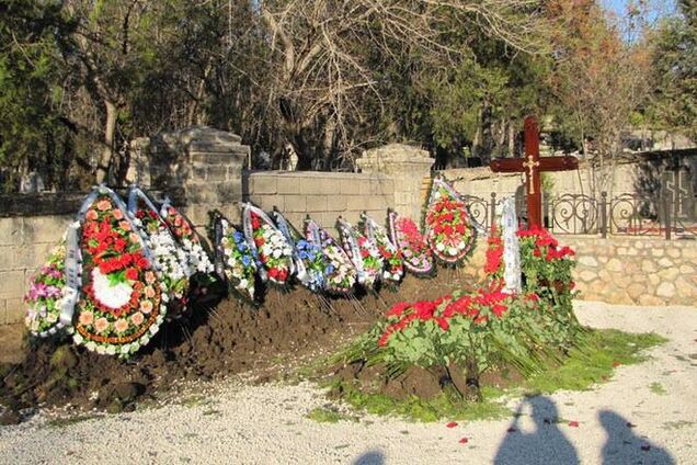 Российский телеканал заявил о задержании своего журналиста на похоронах сына Януковича