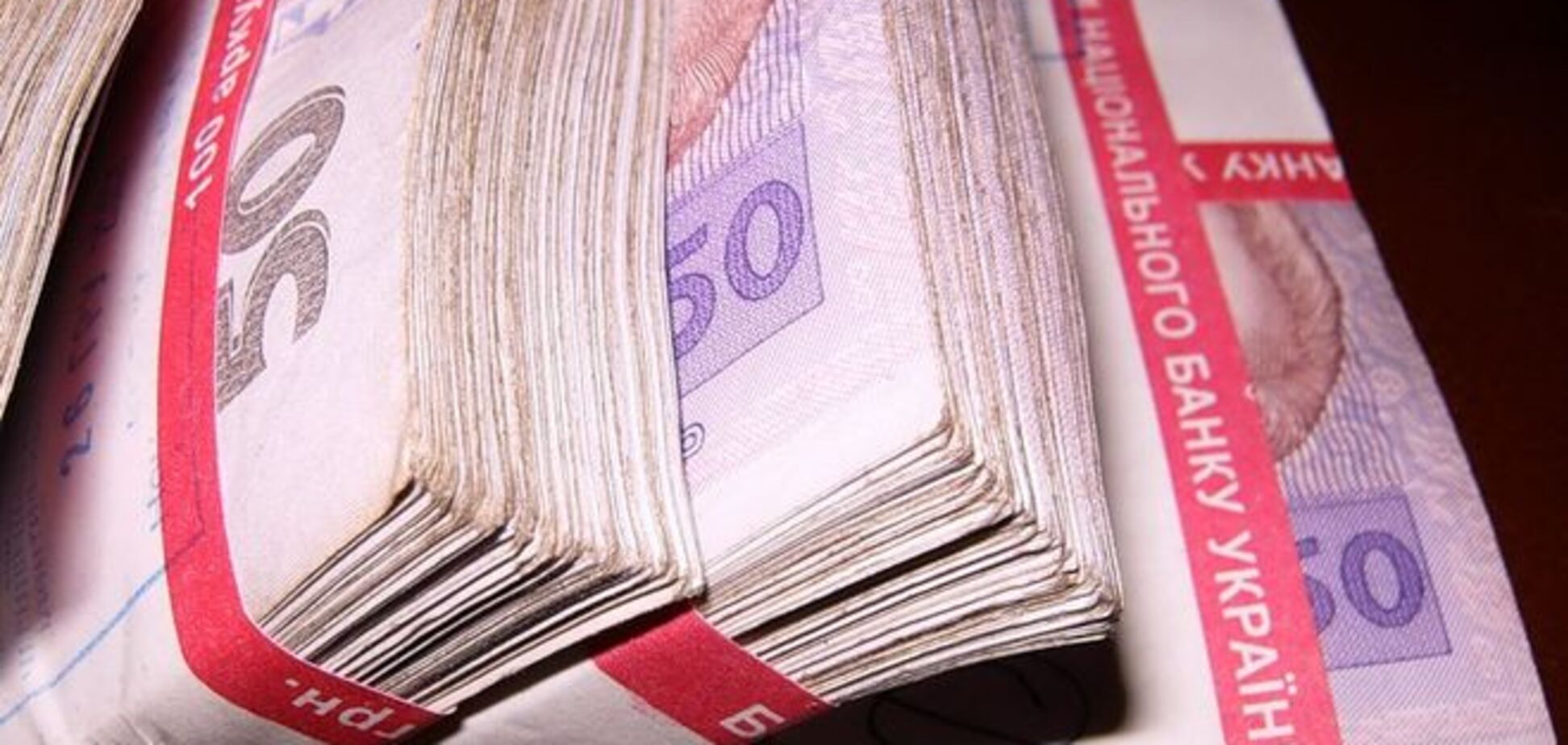 В Украине начались выплаты вкладчикам двух банков-банкротов