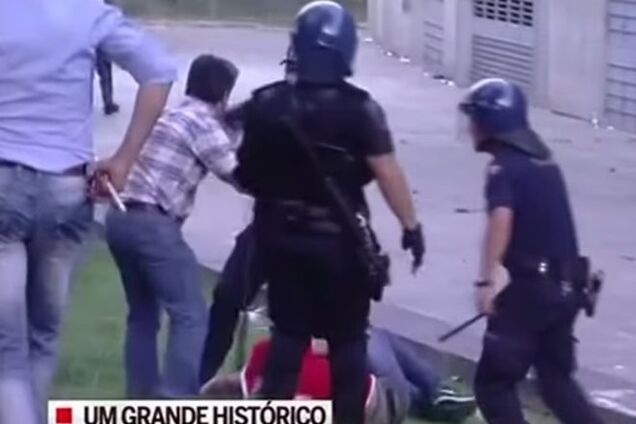 Полиция жестоко избила болельщика на глазах его детей: шокирующее видео