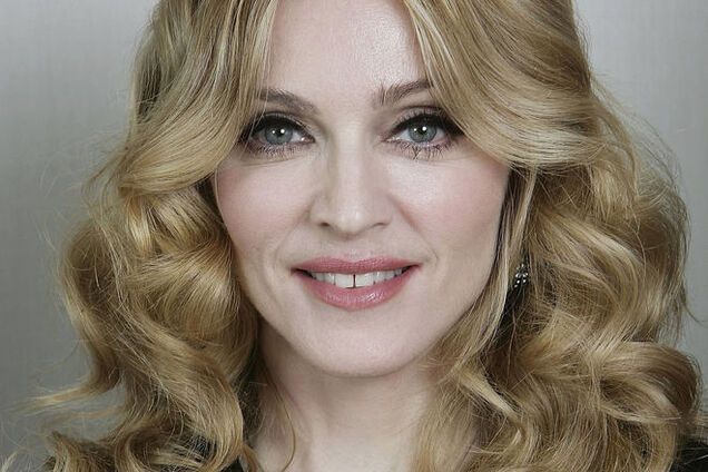 Мадонна вновь вызвала скандал, опубликовав фото целующихся палестинца и израильтянина